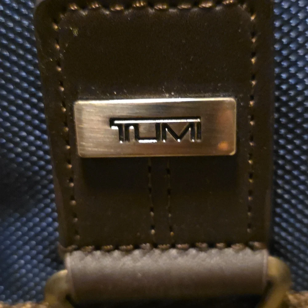 Tumi Navy and Brown Roll-Top Backpack